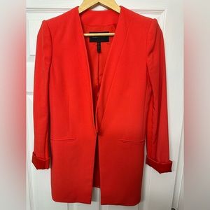 Hot red blazer. Longer length. Stretchy fabric.